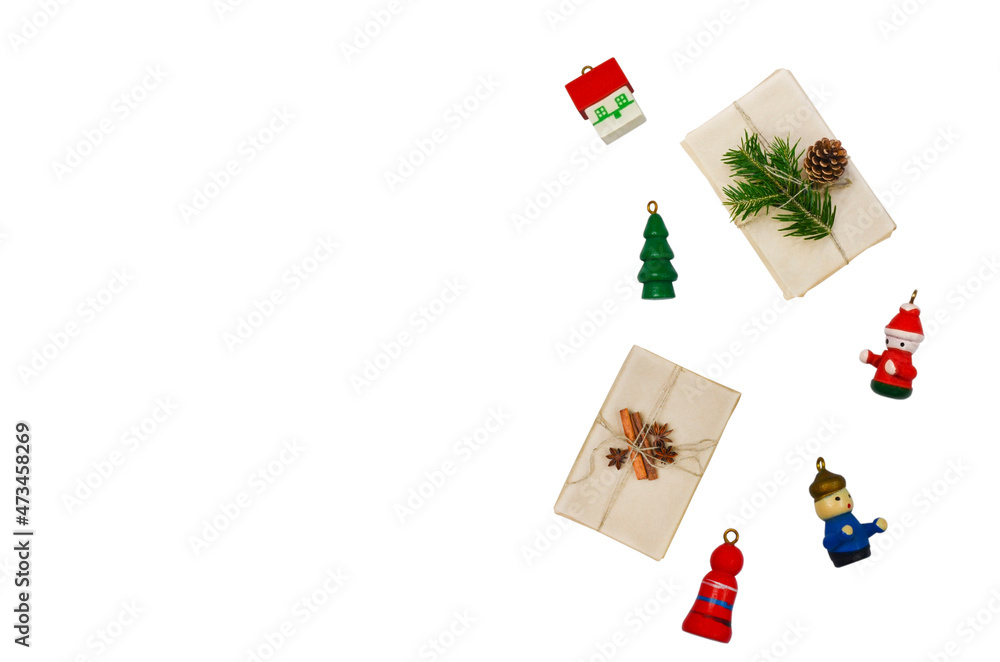 decorations background with copy space text, festive holidays flat lay with zero waste gift fir branches and cone, wooden small christmas tree . decorations background with copy space text, festive holidays flat lay with zero waste gift fir branches and cone, wooden small christmas tree .
