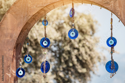 An amulet against the evil eye is a traditional decoration hanging at the entrance to the house. Superstitions and omens in Turkey photo