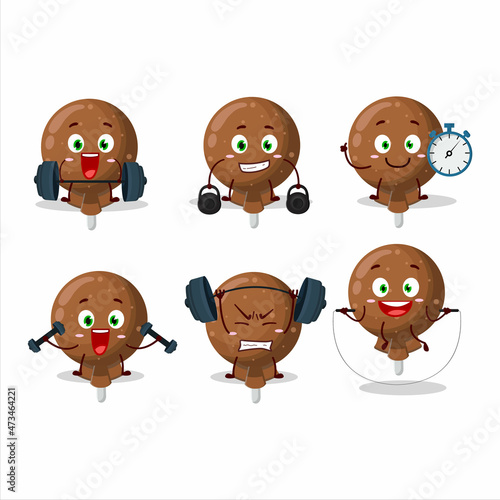 A healthy orange lolipop wrapped cartoon style trying some tools on Fitness center
