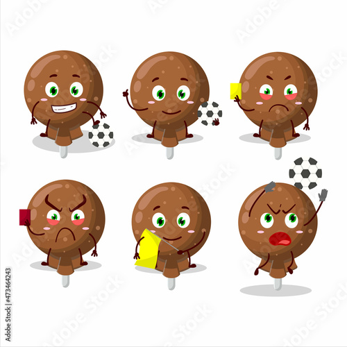 Orange lolipop wrapped cartoon character working as a Football referee