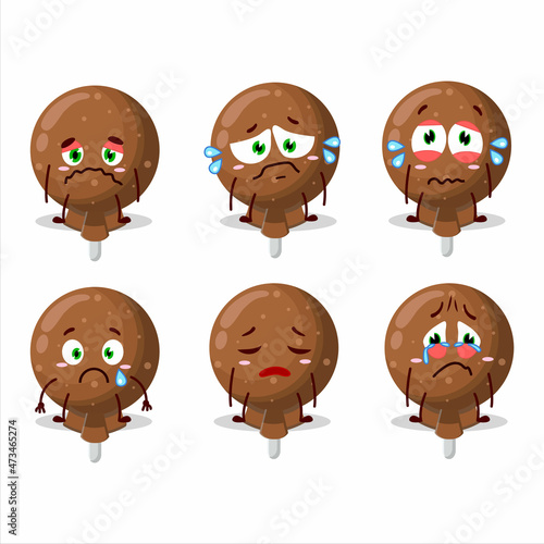 Orange lolipop wrapped cartoon character with sad expression