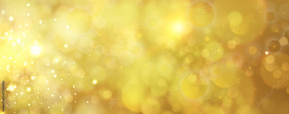 Christmas Gold glowing Background. Golden Holiday Abstract Glitter Defocused Backdrop With Blinking Stars.Tinsel Blurred gold Bokeh on black background. Festive defocused design