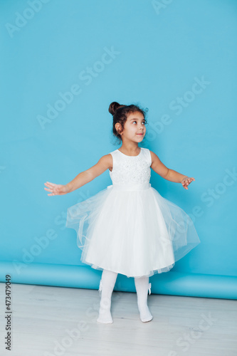 little girl 5 years old in a white princess dress
