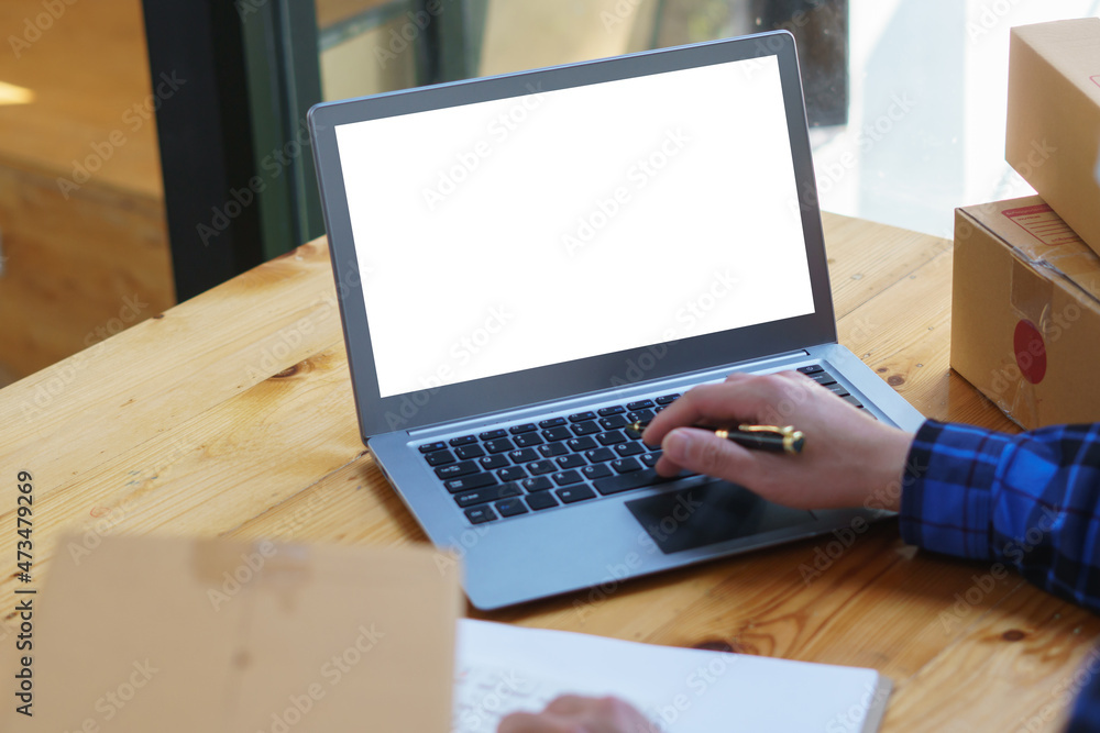 Starting small businesses SME owners male entrepreneurs check online orders to prepare to pack the boxes, sell to customers, sme business ideas online. Starting small businesses SME owners male entrepreneurs check online orders to prepare to pack the boxes, sell to customers, sme business ideas online.