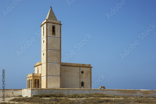 Side view of the church of the Salinas de Cabo de Gata, next to the beach of the Mediterranean Sea