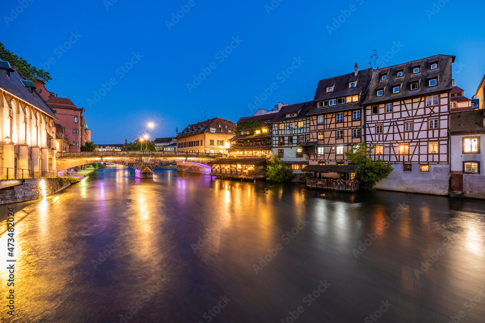 France, Bas-Rhin, Strasbourg, Long exposure of Petite France canal at dusk France, Bas-Rhin, Strasbourg, Long exposure of Petite France canal at dusk
