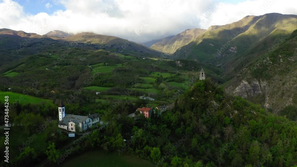 Aerial Residential Houses On Green Natural Hills, Drone Flying Forward Over Landscape - Apennine Mountains, Italy Aerial Residential Houses On Green Natural Hills, Drone Flying Forward Over Landscape - Apennine Mountains, Italy