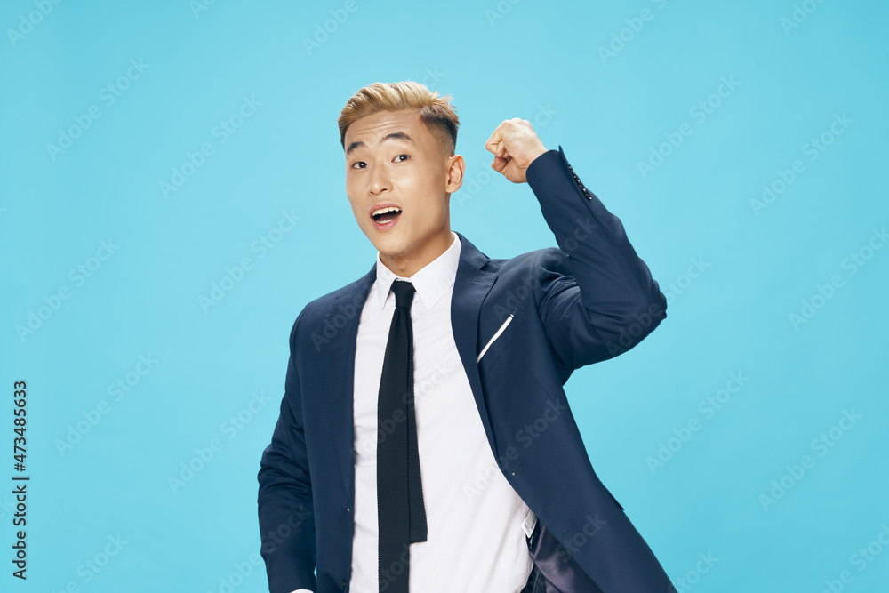 business man asian appearance in suit professional self confidence blue background business man asian appearance in suit professional self confidence blue background