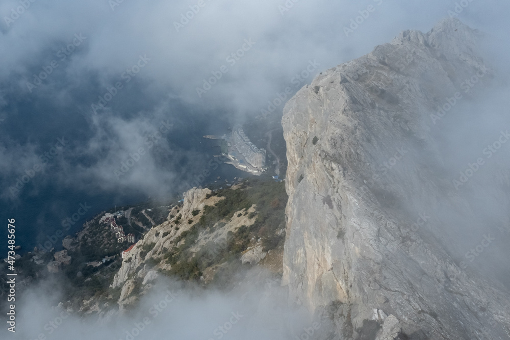 View from Mount Ilyas-kaya on the southern coast of Crimea in fog