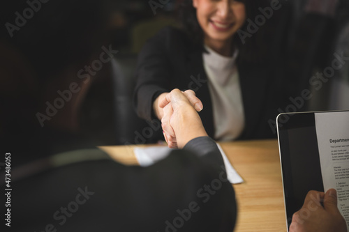 business people are shaking...