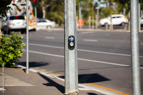 Pedestrian crossing traffic button with an arrow © Passing  Traveler