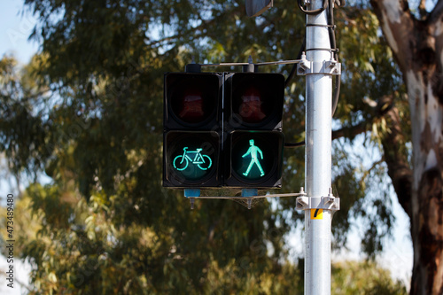 green traffic lights with walking and bike figure in Adelaide, South Australia
