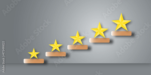 Yellow stars with stair and light on grey background as metaphor for business and financial growth  Success and financial developing  Success in business growth concept  paper art design style.