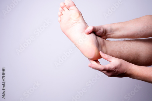 Leg pain, man suffering from leg pain, podiatry concept