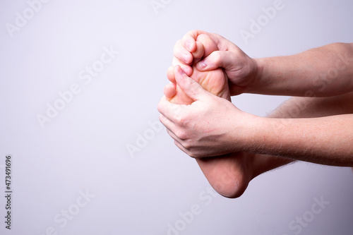 Leg pain, man suffering from leg pain, podiatry concept
