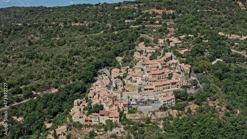 Sainte Croix du Verdon France Aerial v2 establishing shot drone fly around hillside idyllic village by the st croix lake during daytime - July 2021 photo