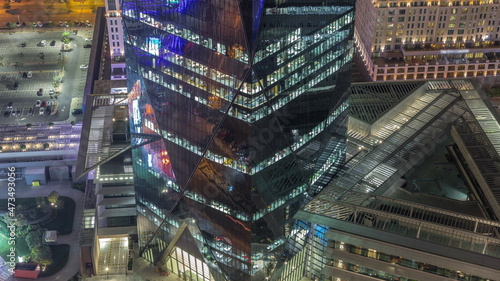 Office tower located in the Dubai International Financial Centre night timelapse
