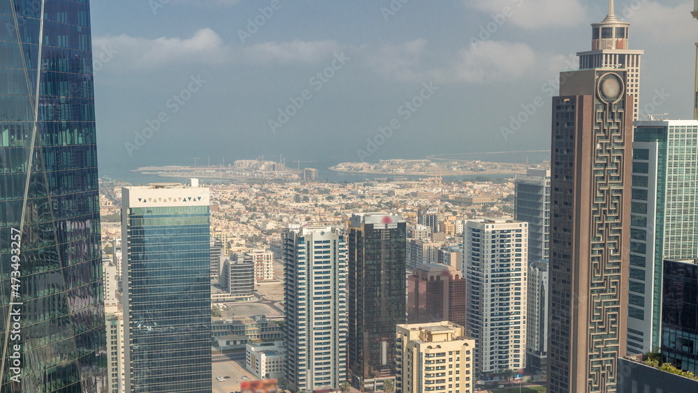 Skyscrapers on Sheikh Zayed Road and DIFC timelapse in Dubai, UAE.