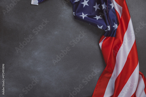 Vintage american flag on grunge background with space for text