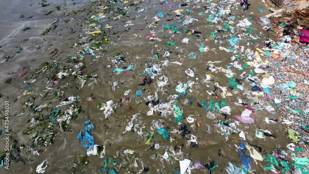 Plastic pollution on beach and in ocean in Vietnam. Most polluted beach, Plastic marine debris. Plastic pollution on beach and in ocean in Vietnam. Most polluted beach, Plastic marine debris.