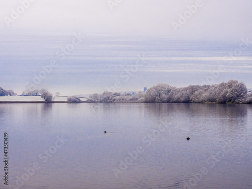 First wonters snow at Pickmere Lake, Pickmere, Knutsford, Cheshire, UK