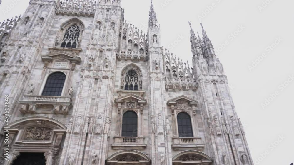 Cathedral Duomo di Milano in Square Piazza Duomo at cloudy morning Milan Italy camera shot 4k Cathedral Duomo di Milano in Square Piazza Duomo at cloudy morning Milan Italy camera shot 4k