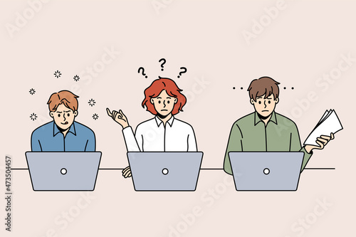 Doing tests and passing exams on laptops concept. Group of young thinking frustrated and concentrated people sitting at laptops thinking fulfilling tasks vector illustration 