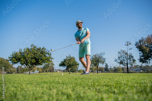 healthy man playing game on green grass. summer activity. professional sport outdoor.