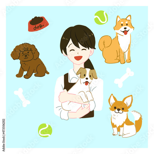 犬を抱っこするペット店員