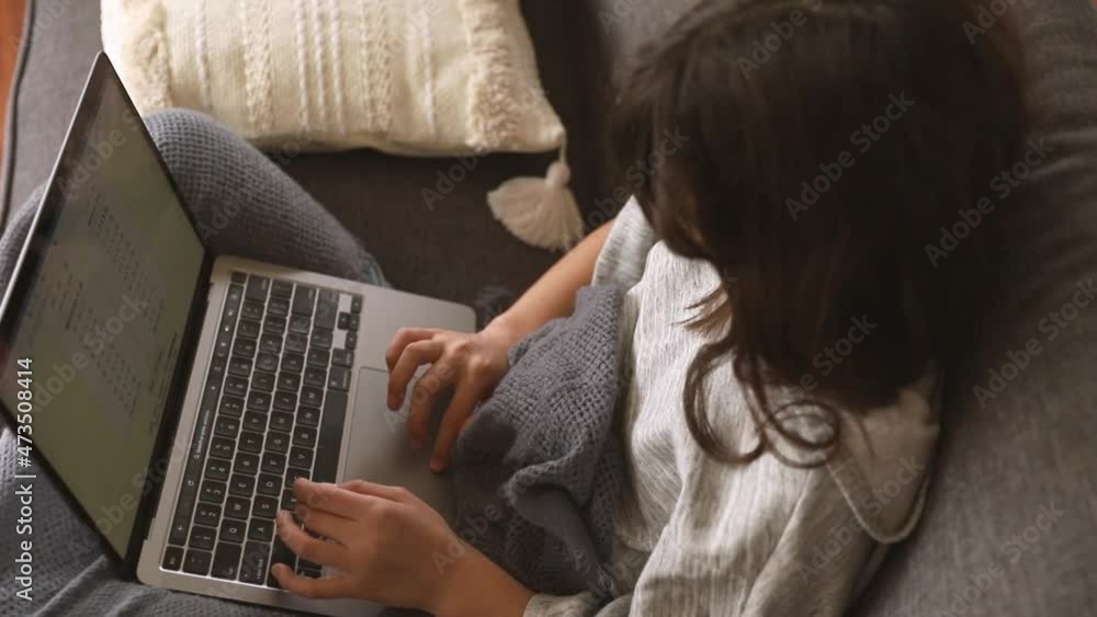 indoor portrait of pre-teen girl doing homework online or browsing internet, mdeia technologies, digital communication or shopping, teenager lifestyle. indoor portrait of pre-teen girl doing homework online or browsing internet, mdeia technologies, digital communication or shopping, teenager lifestyle.