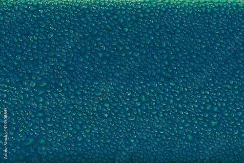 Water drops on turquoise blue background
