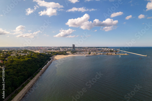 Obraz na płótnie Gdynia city by the sea on a sunny day from a drone. Summer colors and sun rays in Gdynia. w salonie