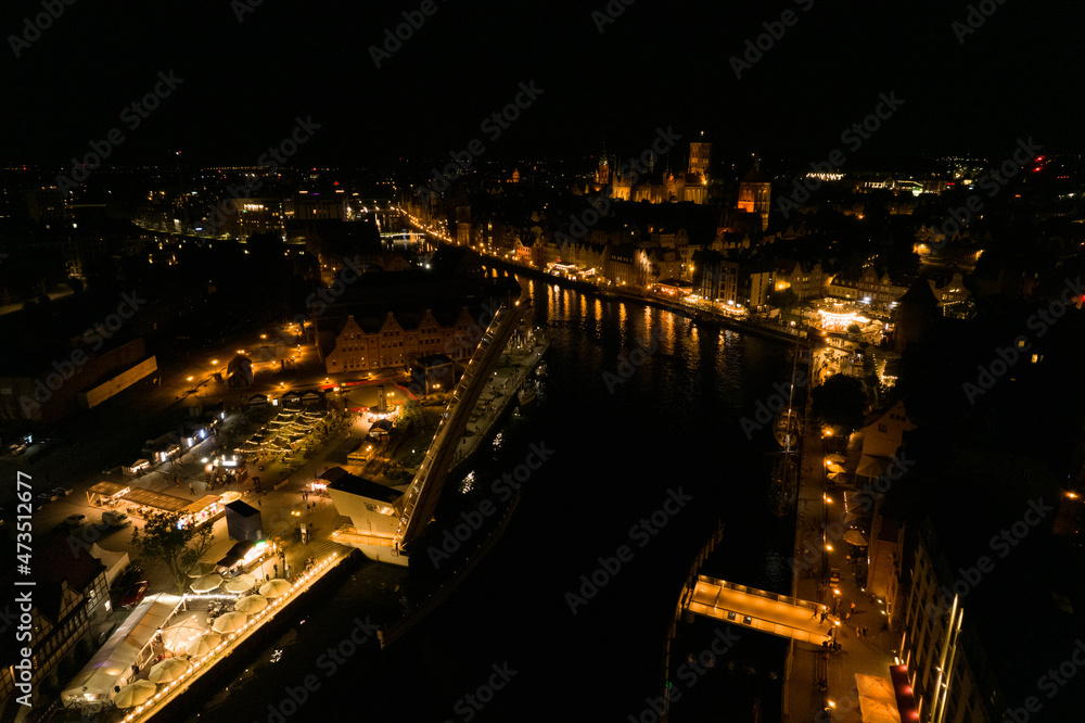 Gdańsk at night. Beautiful city on the Baltic Sea at night from drone flight.