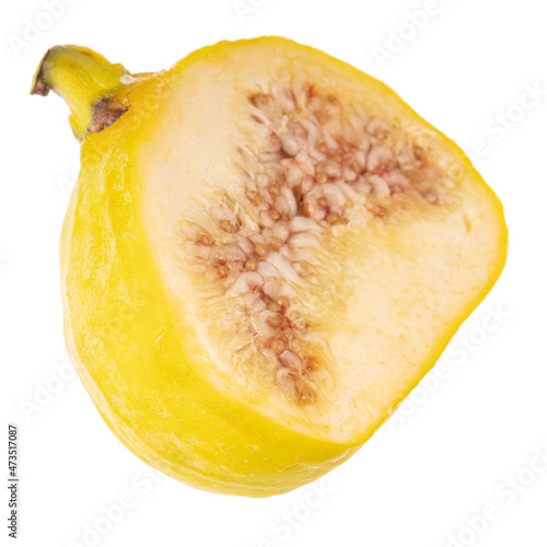 single half of yellow fig isolated on white