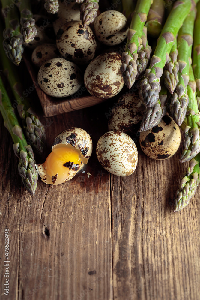 Raw asparagus and quail eggs. Raw asparagus and quail eggs.