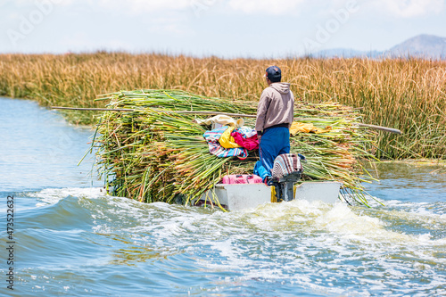 People on the floating Uros Islands on Lake Titicaca in Peru