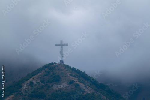 A huge cross on a mountain in the city of Gelendzhik Russia. © Aleksandr