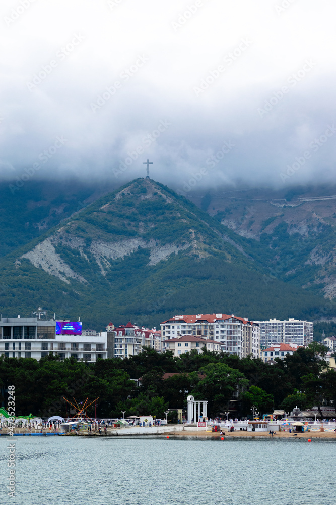 Mount Olympus in the city of Gelendzhik Russia and the cross, vertical view.