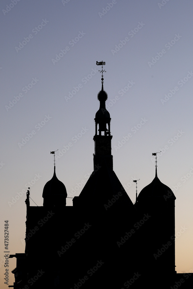 The silhouette of the weighing house in Deventer, the Netherlands, after sunset
