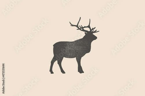 Silhouette of a red deer is drawn with a stamp effect. Wild animal. Vintage emblem. Design element for
