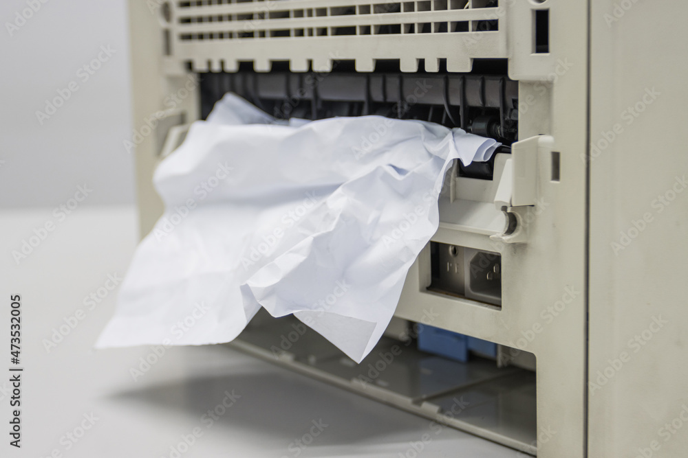 Paper Stuck, Paper Jam In Printer At Office concept office equipment