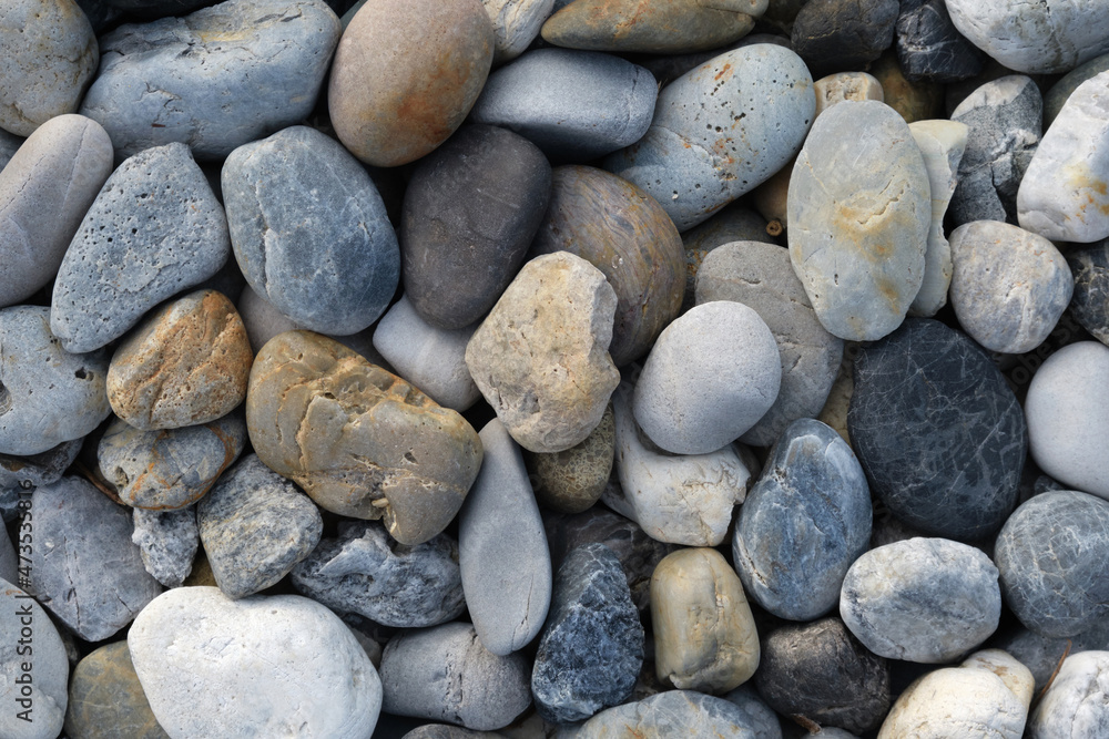 grey pebble stones closeup nature background grey pebble stones closeup nature background