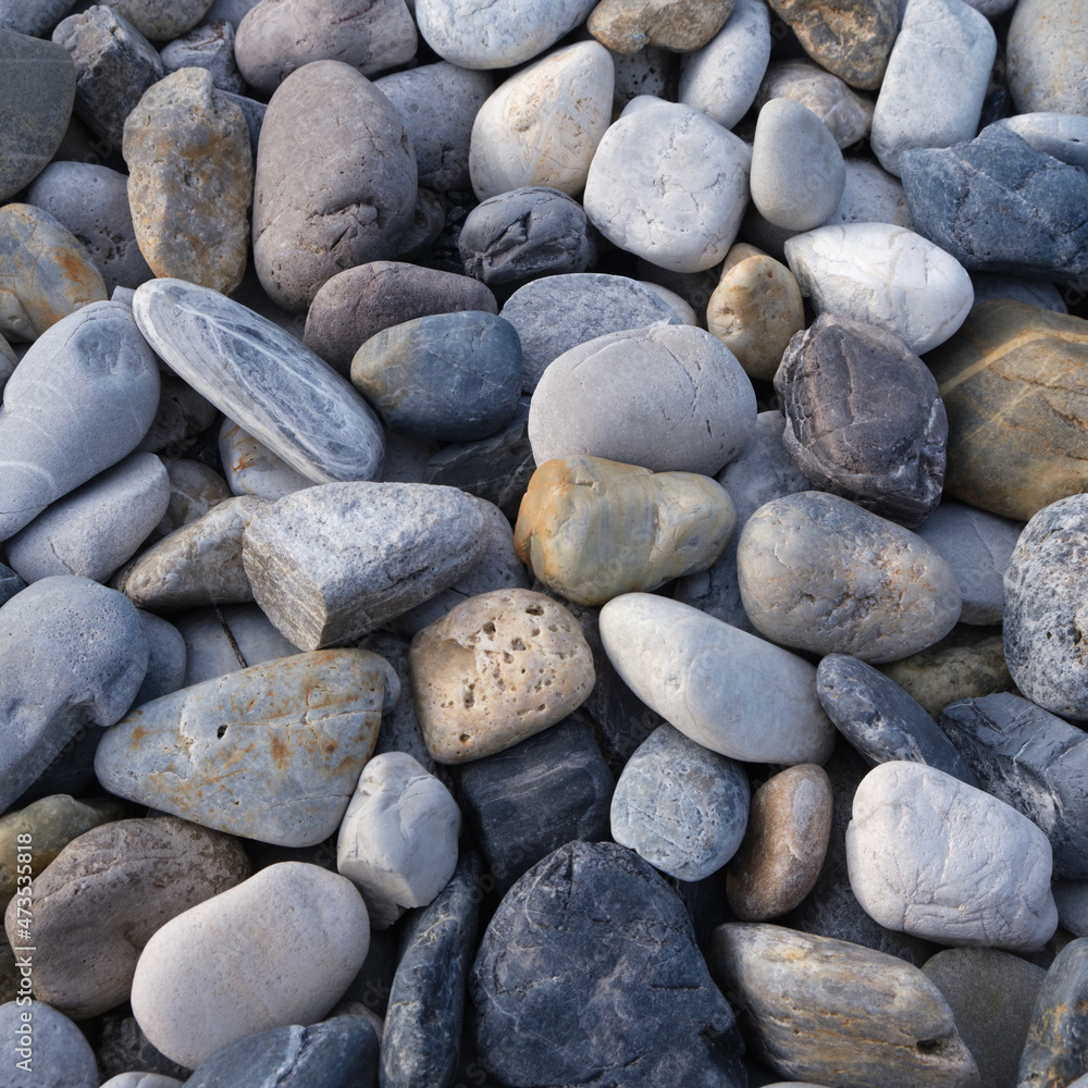 grey pebble stones closeup nature background grey pebble stones closeup nature background