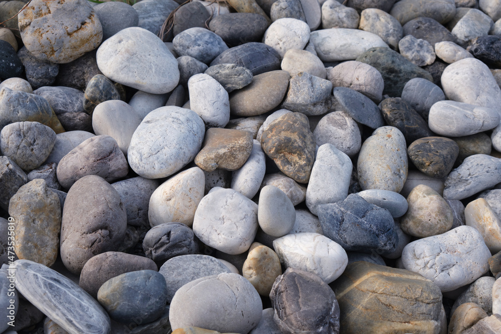 grey pebble stones closeup nature background grey pebble stones closeup nature background