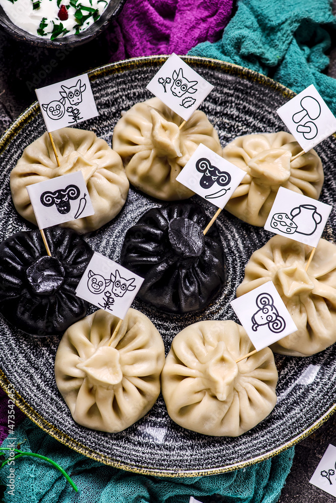 Fototapeta premium khinkali. traditional Georgian dish.. style rustic