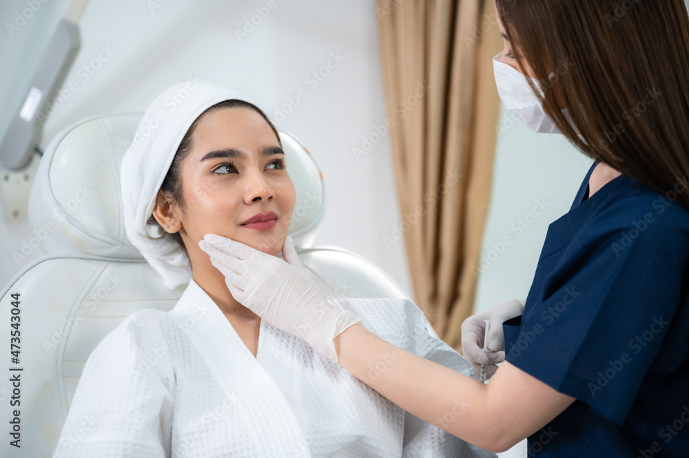 young Asian woman making cosmetology treatment skin injection, Mesotherapy of face beauty care young Asian woman making cosmetology treatment skin injection, Mesotherapy of face beauty care