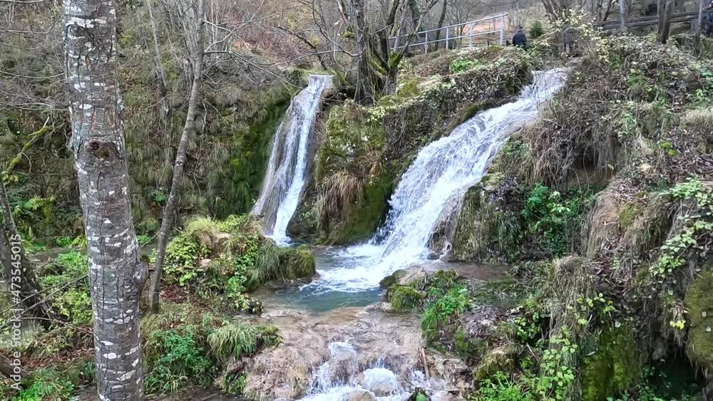 Mountain creek with cascade, clean fresh water stream in forest, autumn season. Mountain creek with cascade, clean fresh water stream in forest, autumn season.