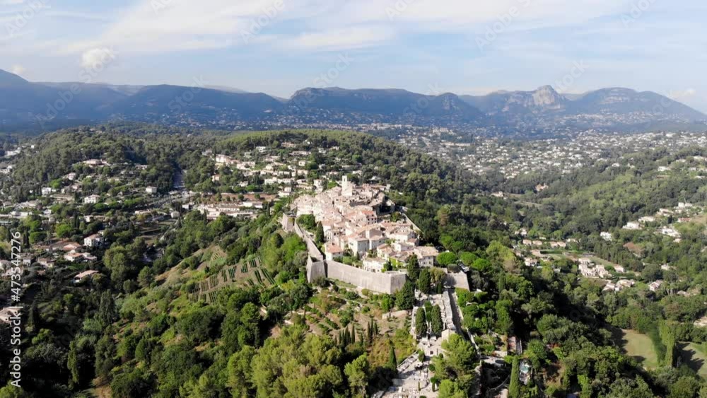Drone shot from Saint-Paul-de-Vence. Medieval fortified village in the south of France. The narrow picturesque streets of the village. Stone facades of the 16th-18th centuries. Green Hills. Chapel Drone shot from Saint-Paul-de-Vence. Medieval fortified village in the south of France. The narrow picturesque streets of the village. Stone facades of the 16th-18th centuries. Green Hills. Chapel