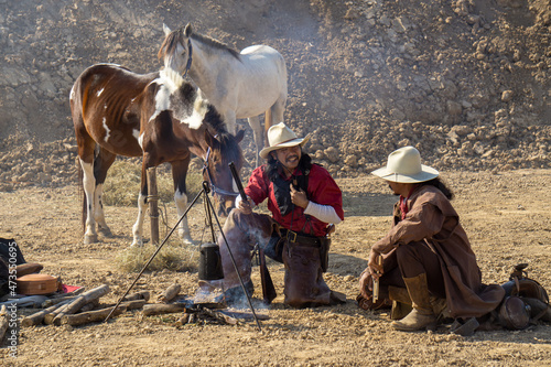 a group of people in the desert