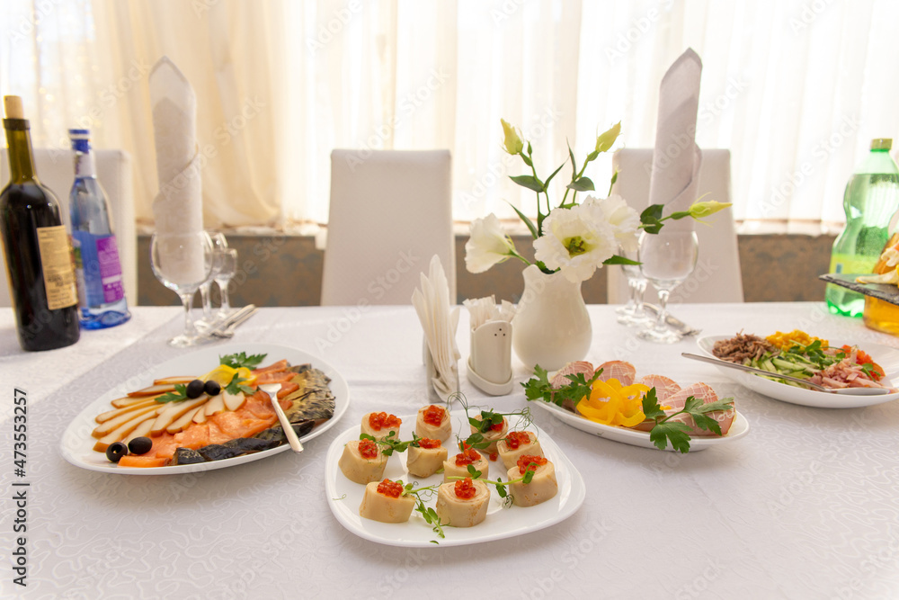 Beautiful table served with glassware and cultery, prepared for festive event. Beautiful table served with glassware and cultery, prepared for festive event.